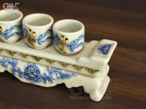 Bộ kỷ ngai 3 chén men hoàng tộc đắp nổi cuốn thư