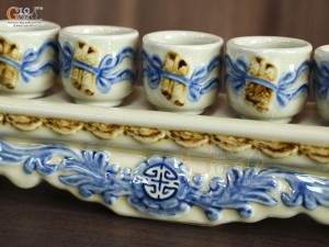 Bộ kỷ ngai 5 chén men hoàng tộc đắp nổi cuốn thư