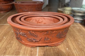 Chậu ba đắp nổi sơn thủy