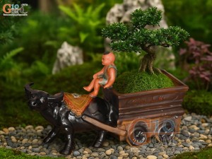 Chậu tượng chú tiểu cưỡi trâu kéo xe Tài Lộc, dài 44cm
