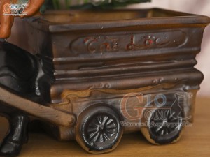 Chậu tượng chú tiểu cưỡi trâu kéo xe Tài Lộc, dài 44cm