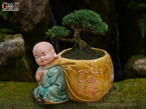Chậu tượng chú Tiểu kéo túi Tài Lộc men bóng, cao 16cm