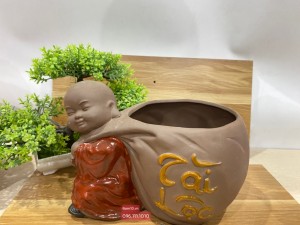 Chậu tượng chú Tiểu kéo túi Tài Lộc men gốm cao 16cm