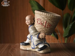 Chậu tượng chú tiểu vác giỏ tài lộc