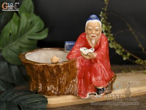 Chậu tượng trồng cây Thần Trà đọc sách men màu đỏ, cao 16cm