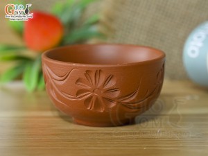 Chén gốm đỏ khắc hoa