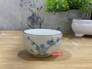 Chén men kem vẽ hoa đào xanh