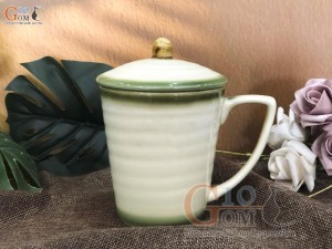 Cốc men vuốt dáng vát, vẽ hoa đào xanh, đường kính 9cm