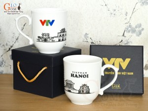 Cốc sứ dáng chóp lửa men trắng cảnh Hà Nội, in logo VTV, 400ml