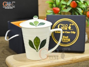 Cốc sứ men kem vẽ Ngò Gai có nắp, in logo