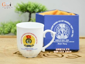 Cốc sứ men trắng dáng chóp lửa in logo quà tặng