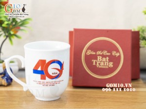 Cốc sứ men trắng dáng chóp lửa in logo quà tặng