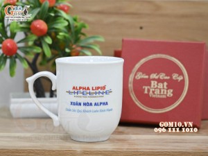 Cốc sứ men trắng dáng chóp lửa in logo quà tặng