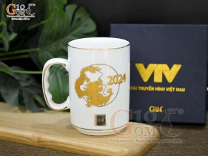 Cốc sứ quai nắm Linh vật Giáp Thìn vàng kim cao cấp 2024