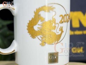 Cốc sứ quai nắm Linh vật Giáp Thìn vàng kim cao cấp 2024