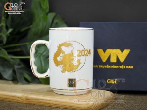 Cốc sứ quai nắm Linh vật Giáp Thìn vàng kim cao cấp 2024