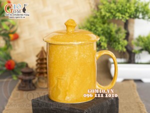 Cốc sứ quai tròn có nắp men đá, màu cam 350ml