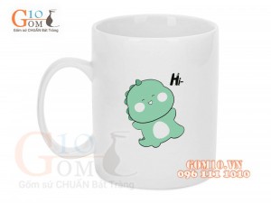 Cốc sứ quai tròn men trắng in hình (nhiều hình ngẫu nhiên)