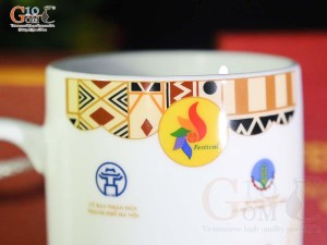Cốc sứ quai tròn men trắng, in logo quà tặng FESTIVAL 2023