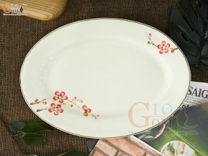 Đĩa bầu dục men kem vẽ hoa đào đỏ, 25x17cm