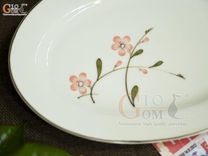 Đĩa bầu dục men kem vẽ hoa Đào hồng, 31x22cm