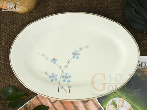 Đĩa bầu dục trơn men kem vẽ hoa Đào xanh, 25x17cm