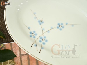 Đĩa bầu dục trơn men kem vẽ hoa Đào xanh, 25x17cm