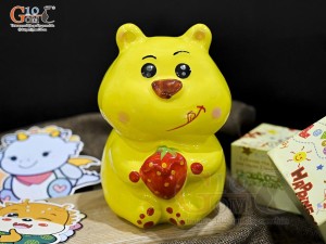Heo sứ tiết kiệm dáng đứng màu vàng, cao 16,5cm