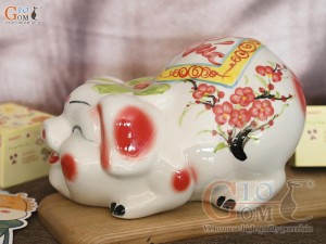 Heo sứ tiết kiệm dáng nằm mắt híp trắng, dài 23cm