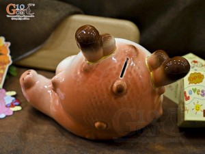 Tiểu Long tiết kiệm dáng nằm ôm vàng màu hồng, dài 30cm