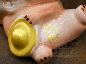 Tiểu Long tiết kiệm dáng nằm ôm vàng màu hồng, dài 30cm