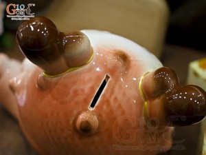 Tiểu Long tiết kiệm dáng nằm ôm vàng màu hồng, dài 30cm