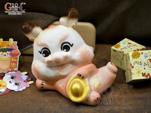 Tiểu Long tiết kiệm dáng nằm ôm vàng màu hồng, dài 30cm