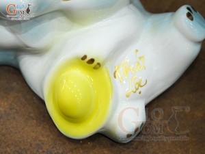 Tiểu Long tiết kiệm dáng nằm ôm vàng màu xanh, dài 25cm