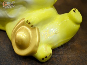 Tiểu Long tiết kiệm dáng nằm ôm vàng, dài 25cm