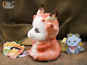 Tiểu Long tiết kiệm dáng ngồi màu cam, cao 30cm