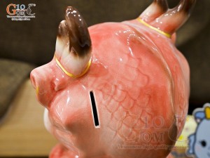 Tiểu Long tiết kiệm dáng ngồi màu cam, cao 30cm