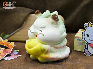 Tiểu Long tiết kiệm dáng ôm vàng màu xanh, cao 17,5cm