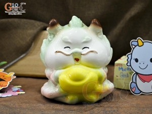 Tiểu Long tiết kiệm dáng ôm vàng màu xanh, cao 17,5cm