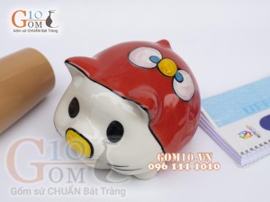Heo sứ tiết kiệm mắt tròn màu đỏ, cao 16cm.