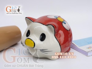 Heo sứ tiết kiệm mắt tròn màu đỏ, cao 16cm.