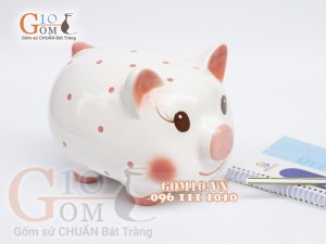 Heo sứ tiết kiệm màu trắng chấm bi hồng dài 23cm
