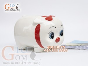 Heo sứ tiết kiệm màu trắng họa tiết nơ đỏ dài 19cm