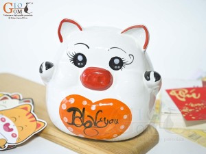 Heo sứ tiết kiệm màu trắng tim cam, cao 15cm