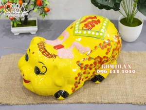 Heo sứ tiết kiệm nằm phệ, màu vàng dài 35cm