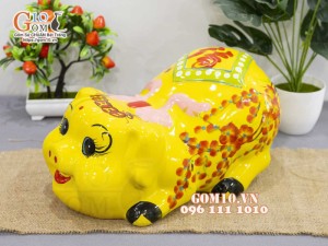 Heo sứ tiết kiệm nằm phệ, màu vàng dài 35cm