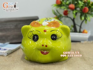 Heo sứ tiết kiệm xanh đeo nơ cam, 16cm