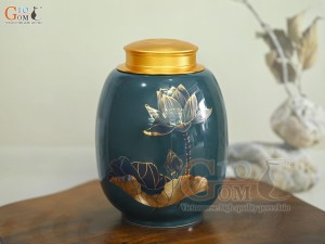 Lọ chè dáng béo họa tiết hoa Sen vàng kim, nền xanh dương, 300g Lọ chè dáng béo họa tiết hoa Sen vàng kim, nền xanh dương, 300g