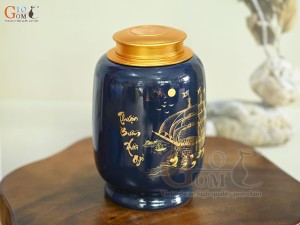 Lọ chè dáng đứng họa tiết Thuận Buồm Xuôi Gió vàng kim, nền xanh dương, 300g