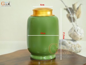 Lọ chè dáng đứng họa tiết Thuận Buồm Xuôi Gió vàng kim, nền xanh lá, 300g